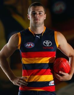 AFL 2013 Portraits - Adelaide Brad Crouch poses for a photograph during the Adelaide Crows 2013 team photo day at AAMI Stadium, Adelaide. (Photo: Michael Willson/AFL Media)